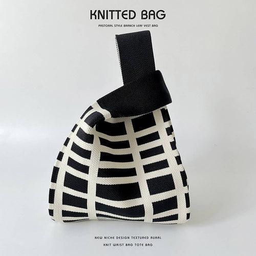 BLACK AND WHITE GRID STITCH HANDBAG